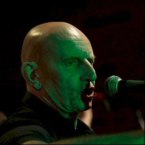 NICKY RUBIN - voice is sober and dignified...