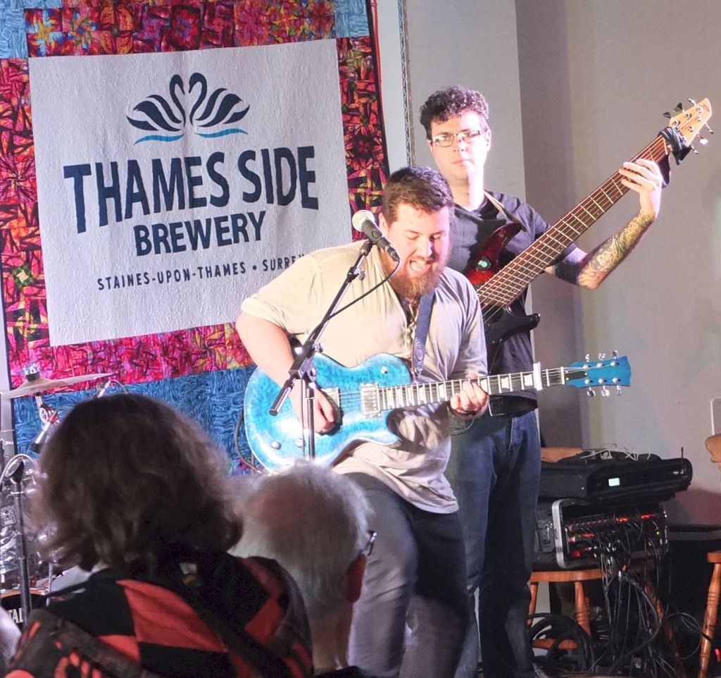 ALEX VOYSEY and his accomplished bandmates played some intensifying blues-power boomlets and increased the roar & harmonicity at the Thames Side venue a hundredfold as his megadecibel numbers got toes a-tapping around the Tap Room...