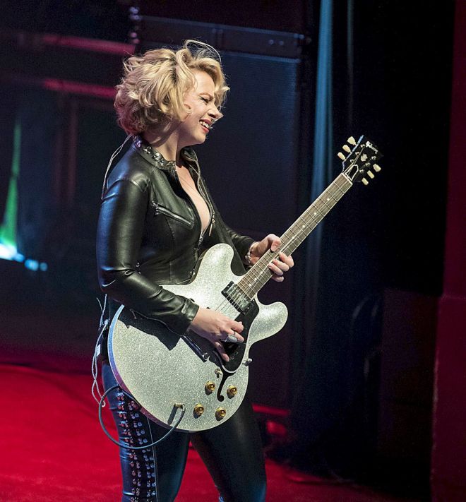 SAMANTHA FISH Live at London Shepherds Bush Empire - photo credit Simon Green - female guitar player with blue guitar on stage