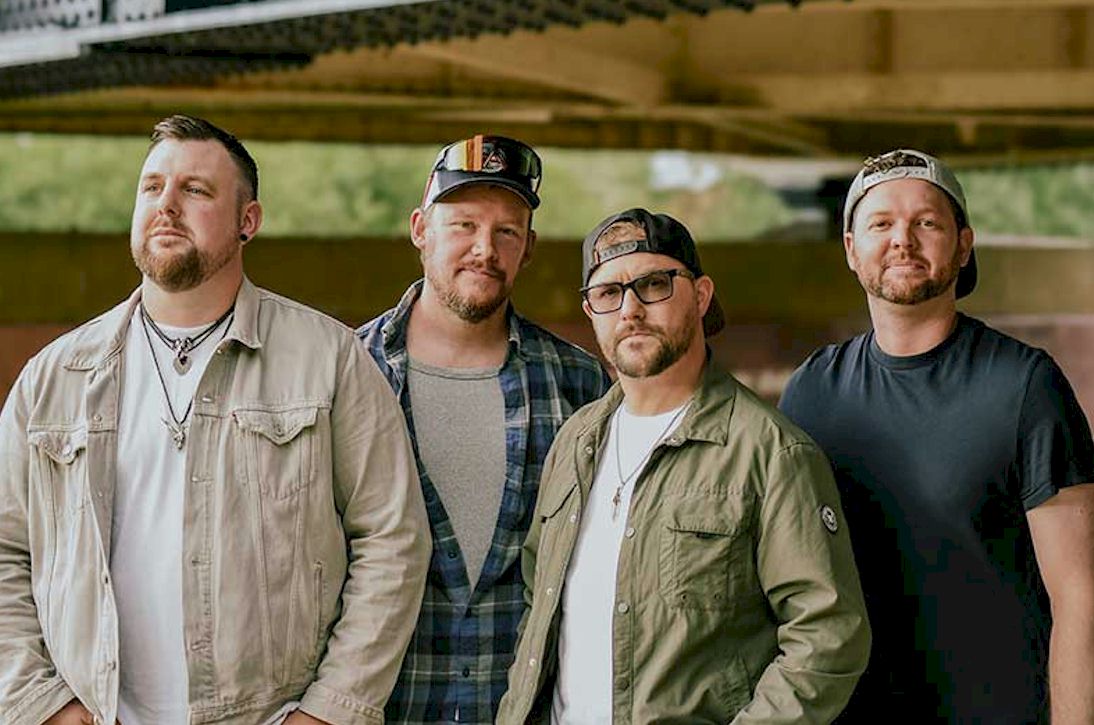WOOD BURNT RED Hold On Tight - photo credit © Lizzie Franklin - four white men standing - three have baseball caps