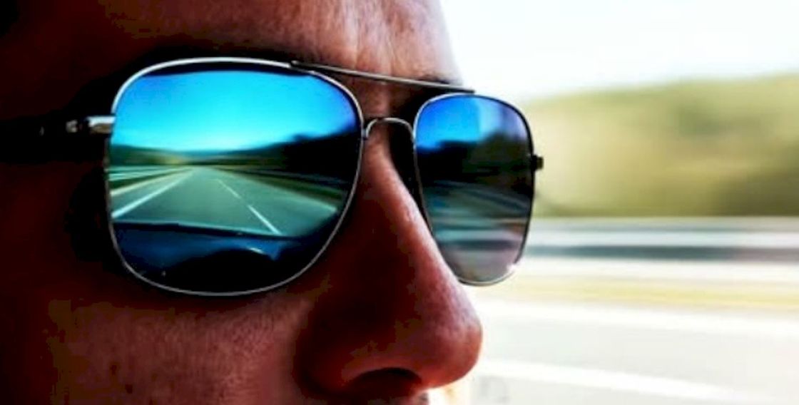 Mockingbird Hill Melting Pot - video still from Mad Ears Productions showing white man wearing sunglasses in a car